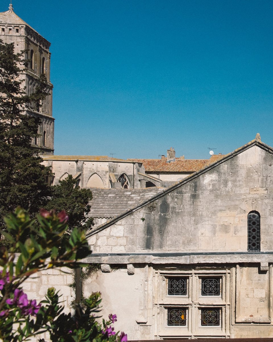 View of Saint-Trophime Cloister from hotel Le Cloître's rooftop terrace in Arles